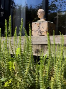 Jacky's sculptured head watches over